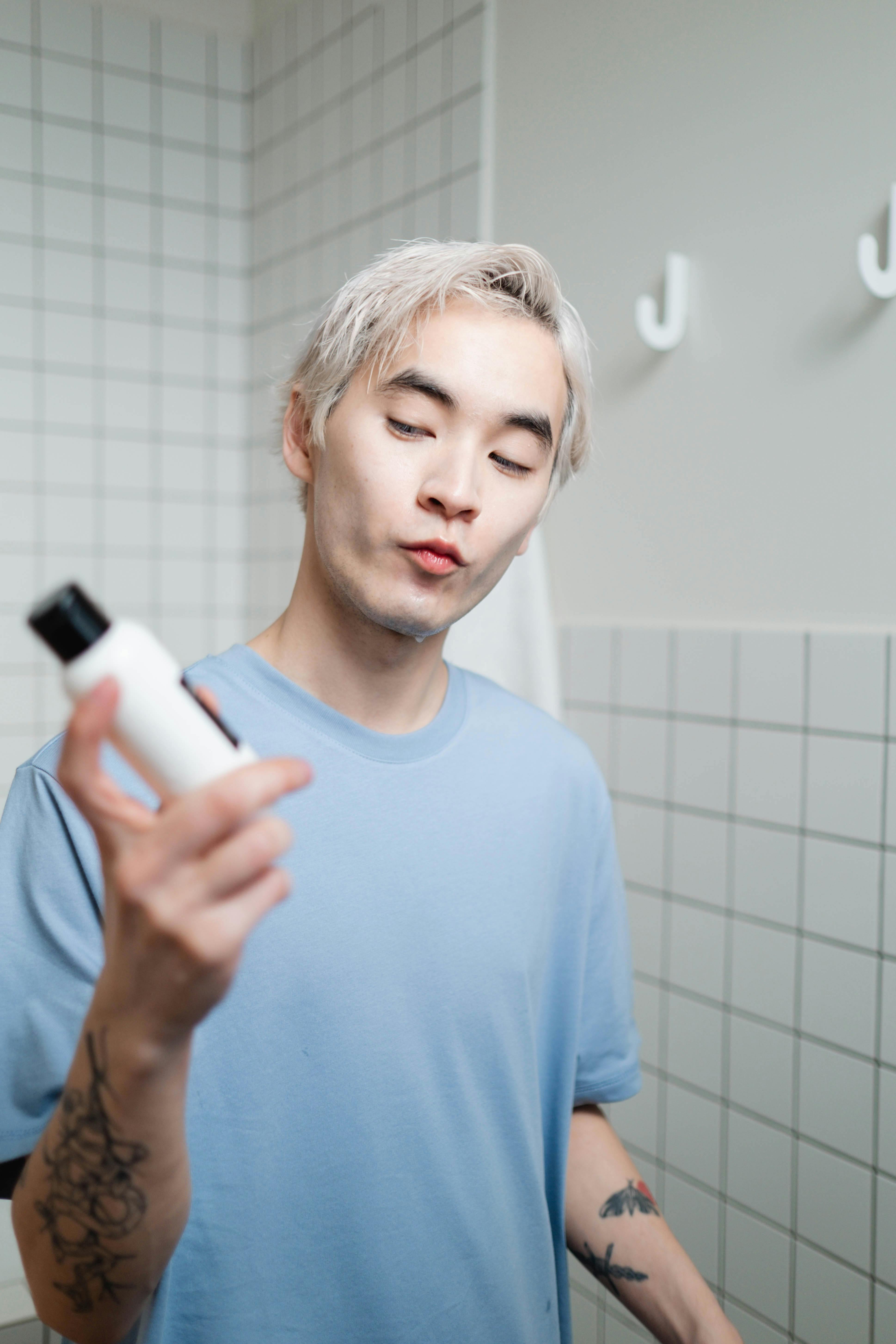 Reading skincare ingredient label — informed K-beauty