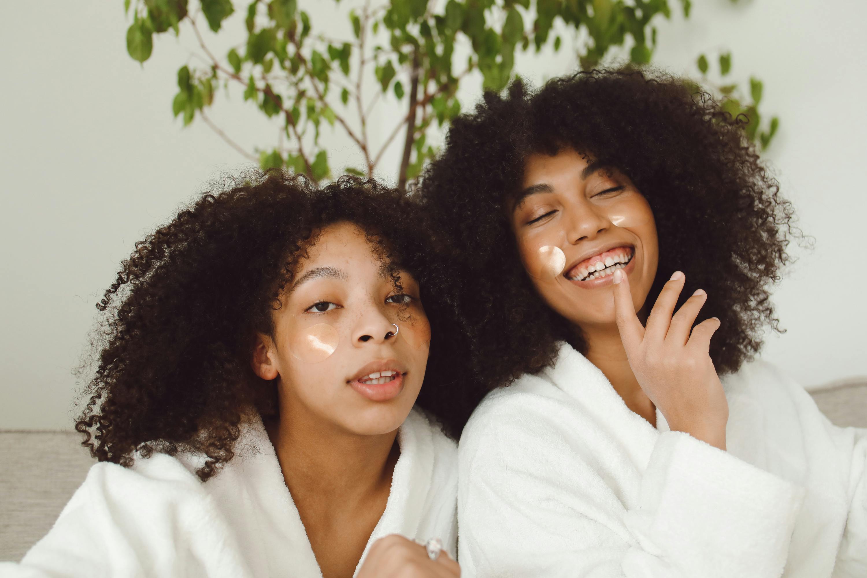 Women applying skincare — centella for all skin types